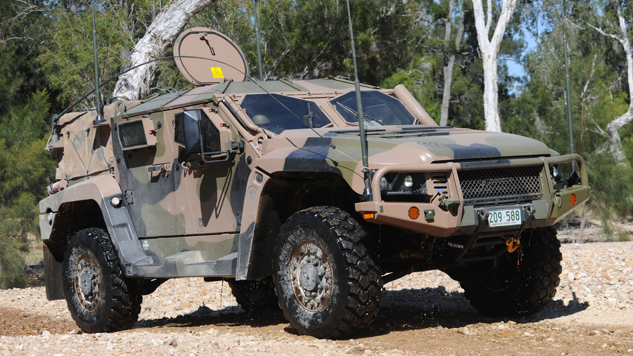 Military vehicle operating in harsh Australian terrain