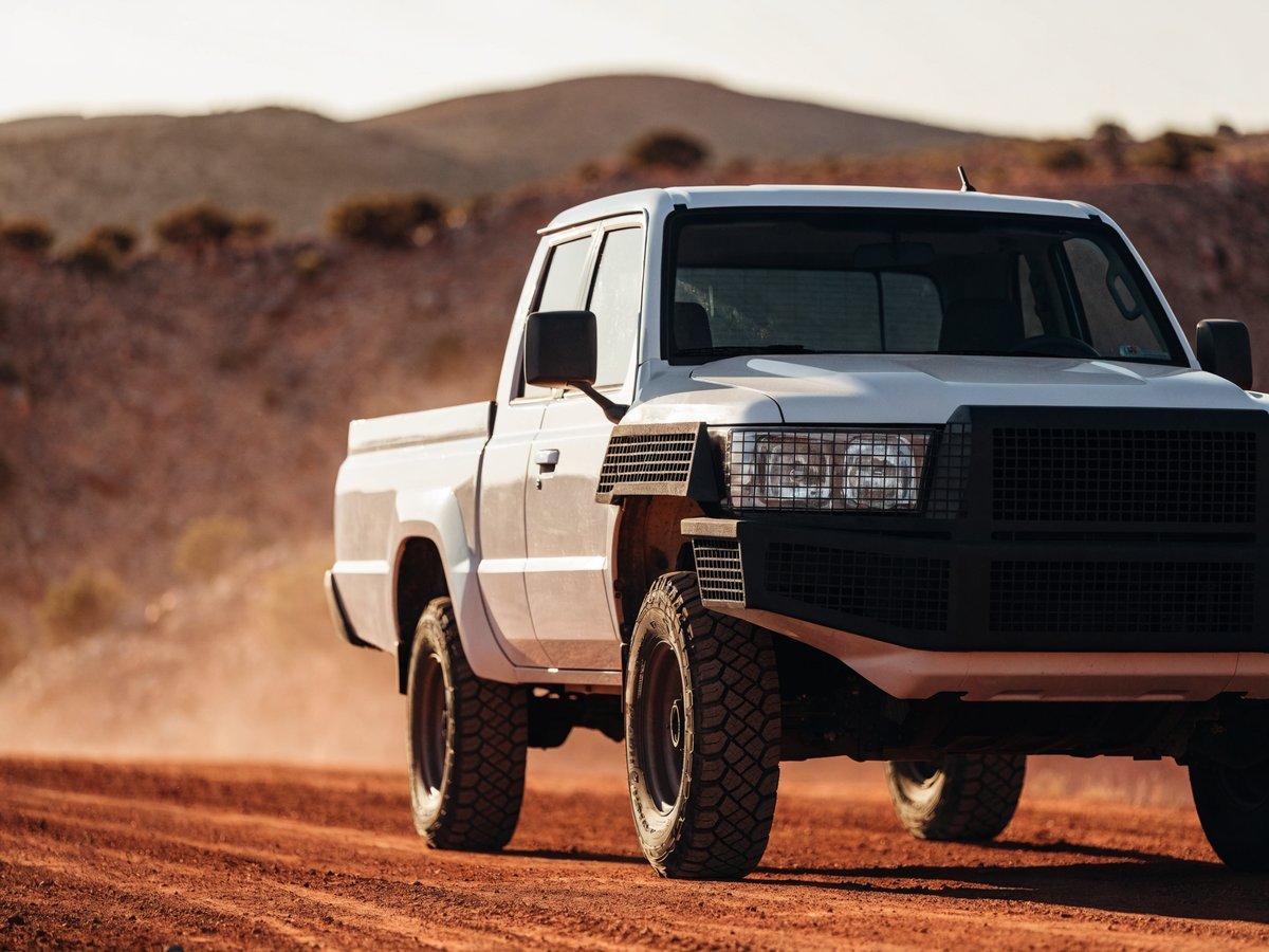 D-Flector ruggedised bolt-on stone-guard protection system fitted to a 4WD vehicle in the Australian outback